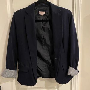 Navy blazer - size 4. Cute detail on sleeve.